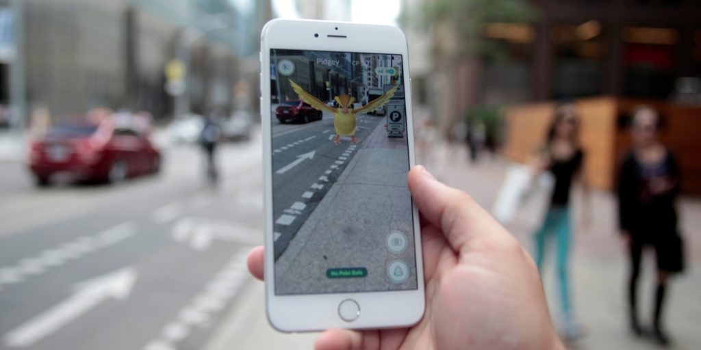 A "Pidgey" Pokemon is seen on the screen of the Pokemon Go mobile app, Nintendo's new scavenger hunt game which utilizes geo-positioning, in a photo illustration taken in downtown Toronto, Ontario, Canada July 11, 2016. REUTERS/Chris Helgren